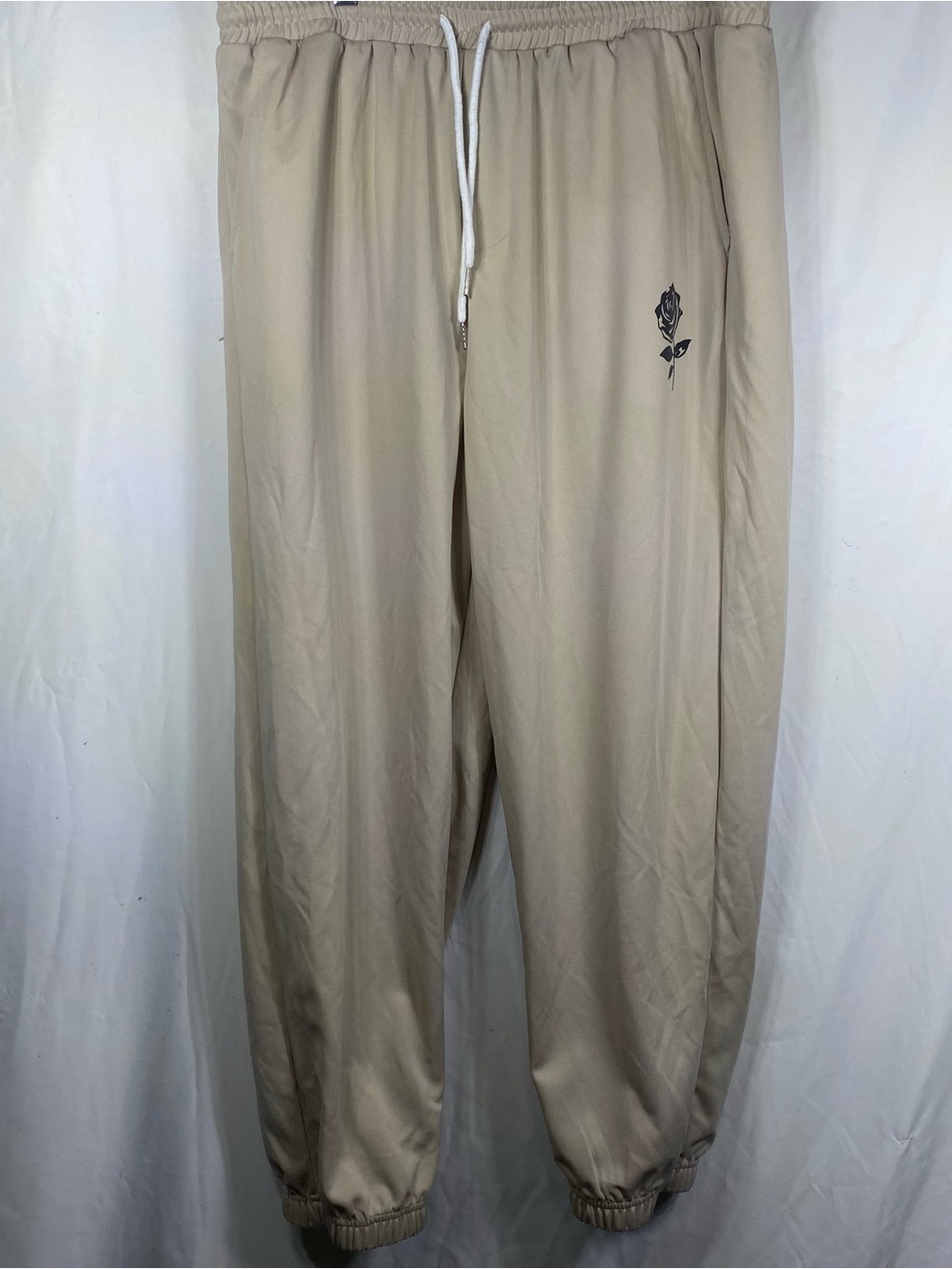 SHEIN Beige Jogger Pants with Black Rose Graphic